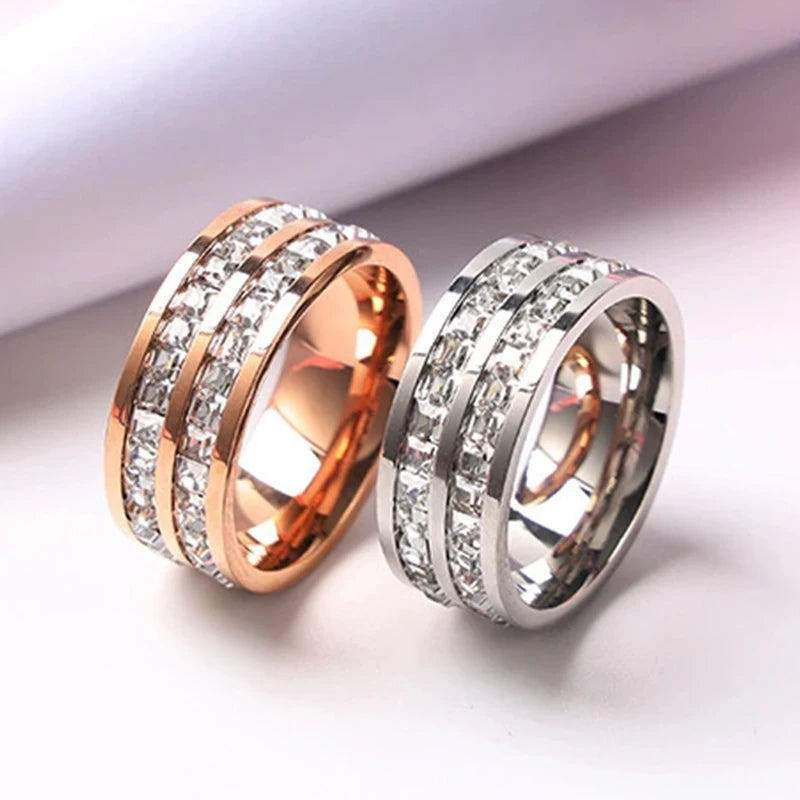 Luxus Damenring in Roségold-Optik aus Edelstahl mit quadratischen Zirkonia, wahlweise ein- oder zweireihig. Stilvoll und romantisch